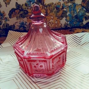 Pink glass candy dish with a lid. Vintage